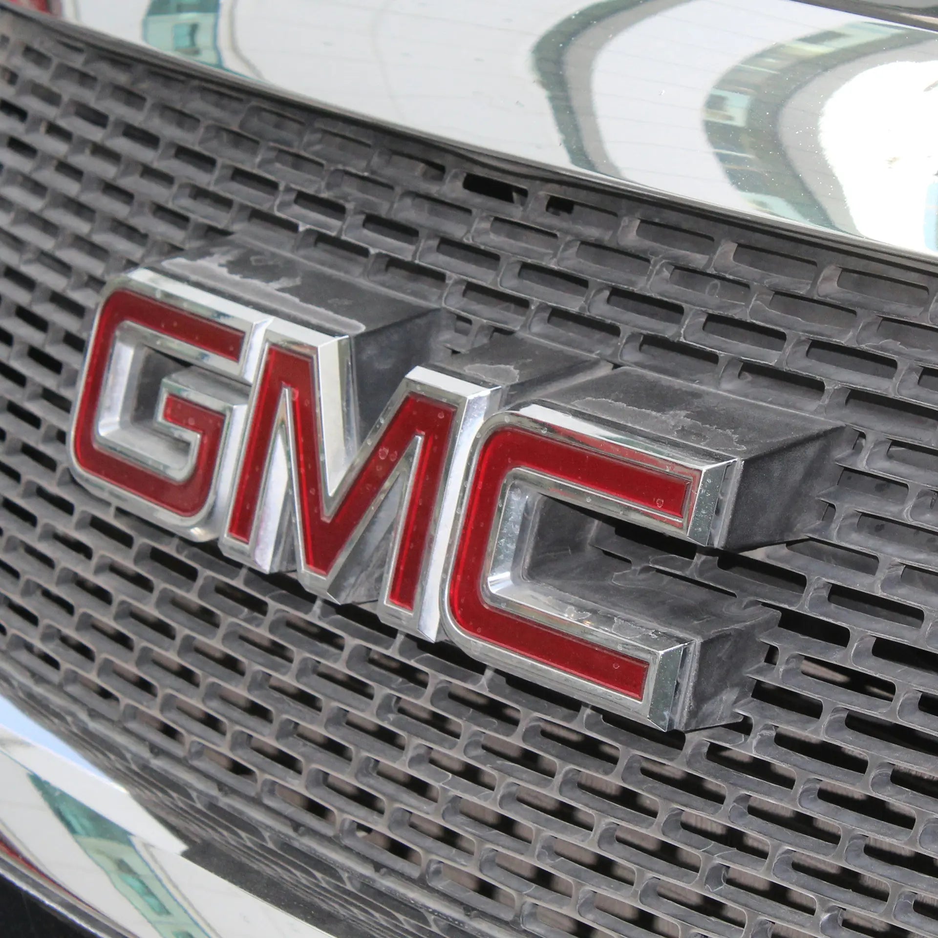 GMC badge on a truck. 