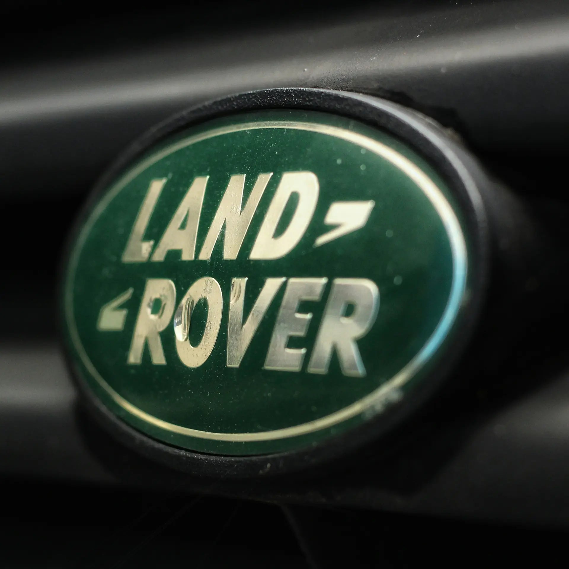 Land Rover badge on a car. 